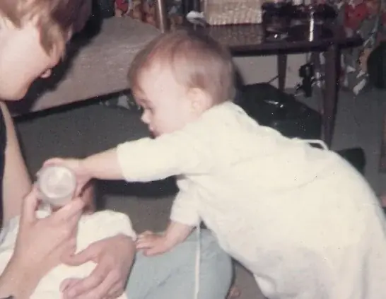 Janinne Gardner caring for a newborn baby